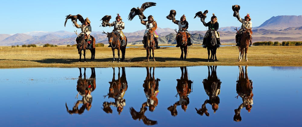 People on horseback taking part in the Golden Eagle Festival in Bayan-Ölgii, Mongolia.
